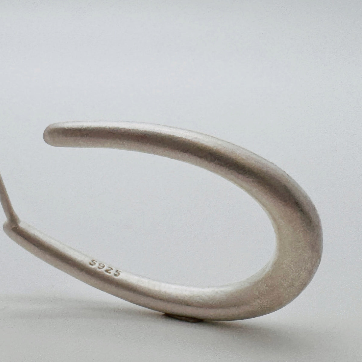 Quiet Loop 925 sterling silver hook earrings by Orin