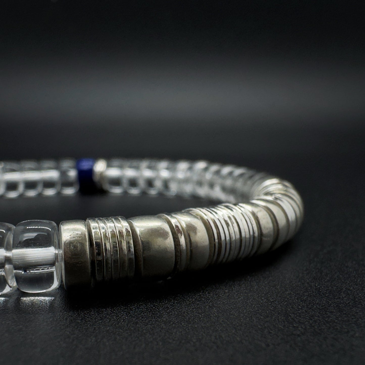 Close-up of Tide 01 bracelet featuring clear quartz beads and sterling silver details