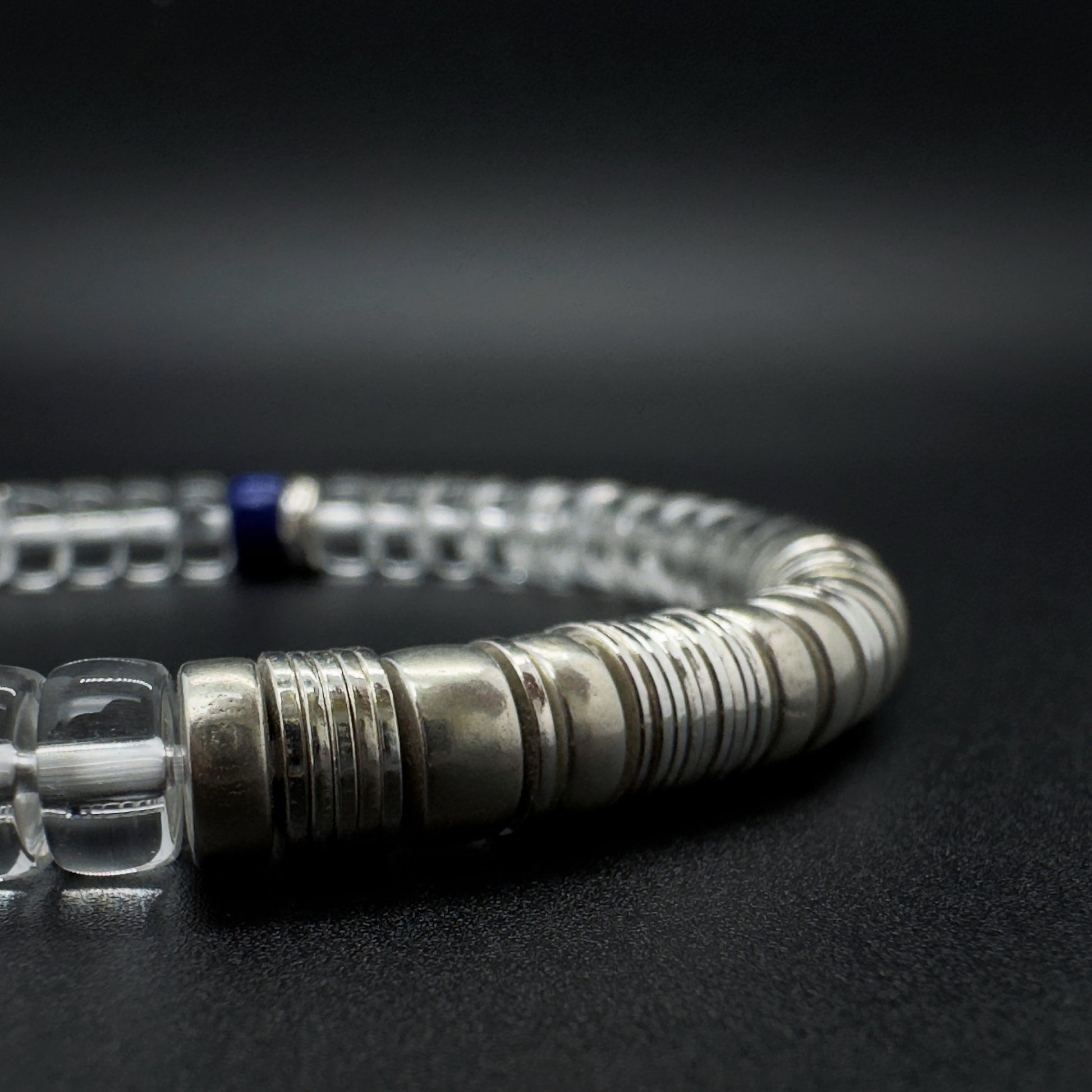 Close-up of Tide 01 bracelet featuring clear quartz beads and sterling silver details