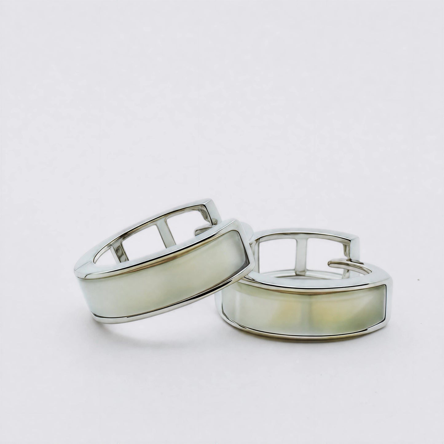 Lunar Hush sterling silver mother-of-pearl hoop earrings.