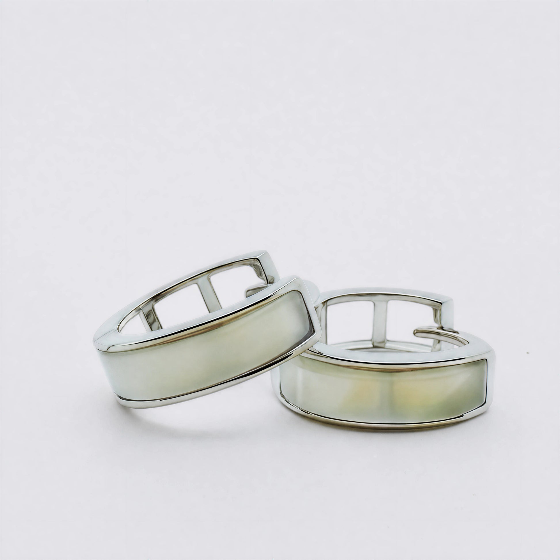 Lunar Hush sterling silver mother-of-pearl hoop earrings.