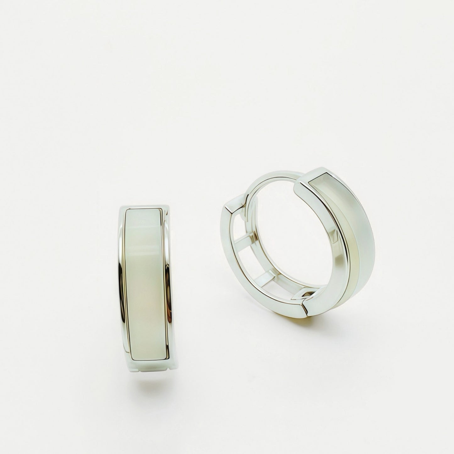Lunar Hush sterling silver mother-of-pearl hoop earrings.
