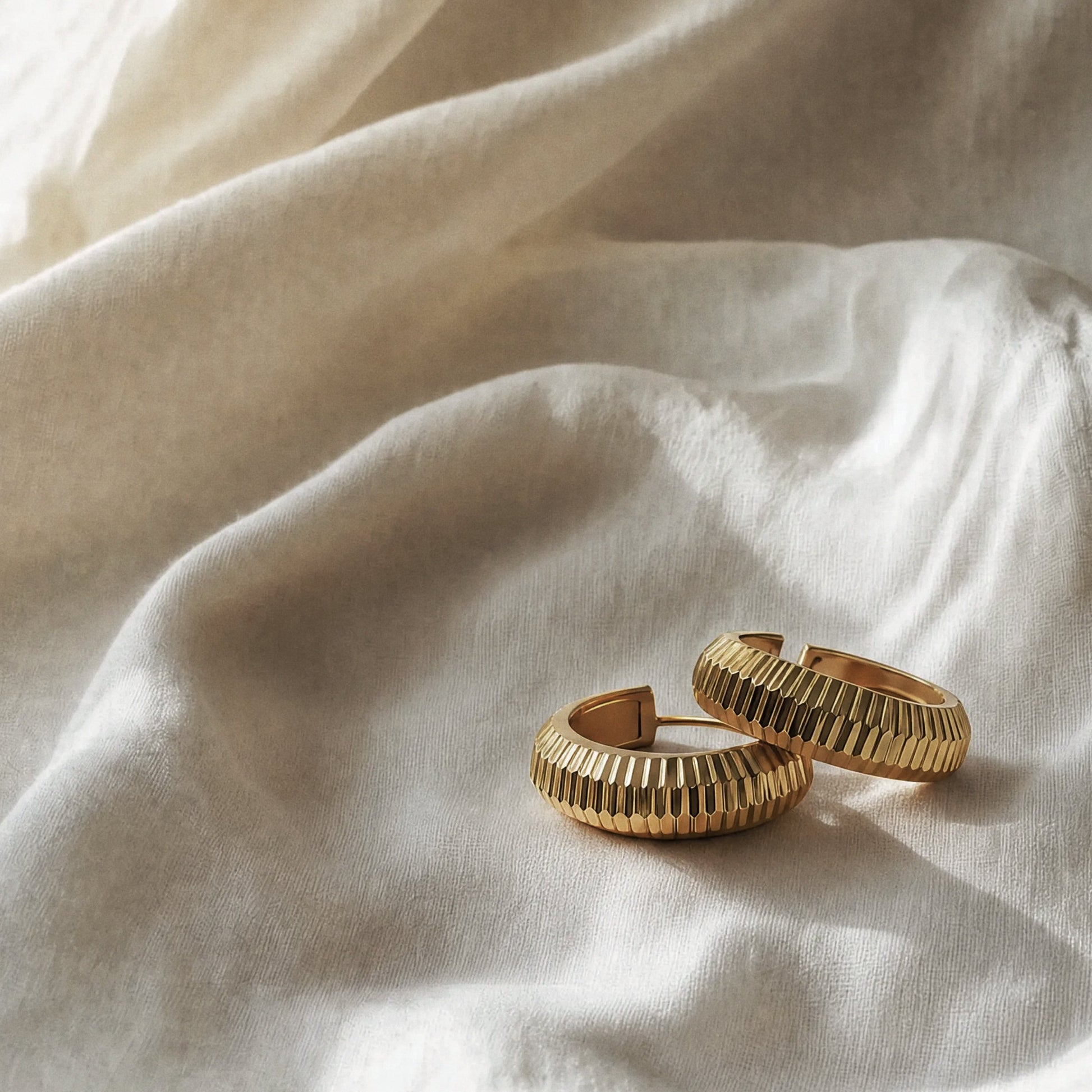 Peak Light sterling silver stud earrings by Orin