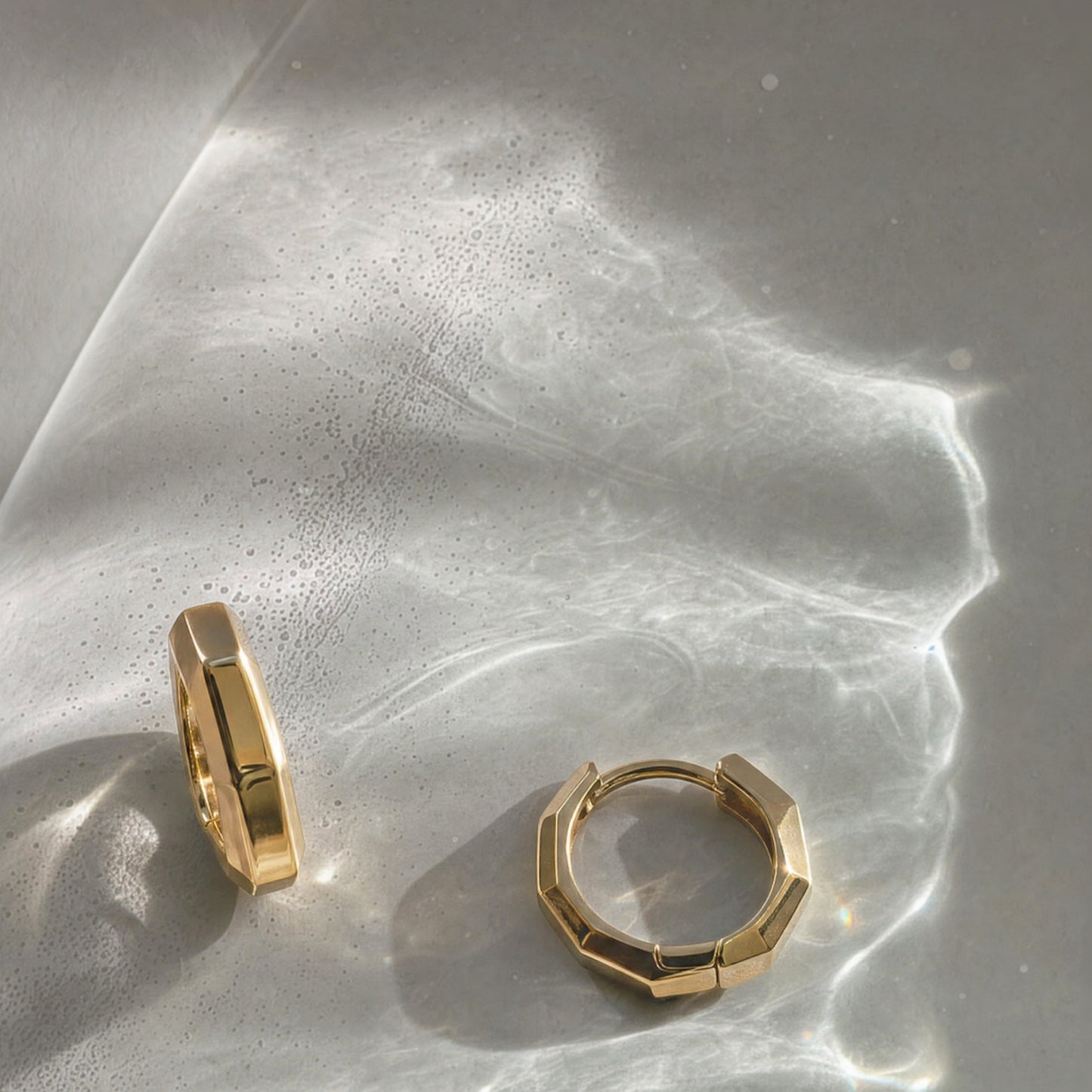 Wishing Coin sterling silver hoop earrings.