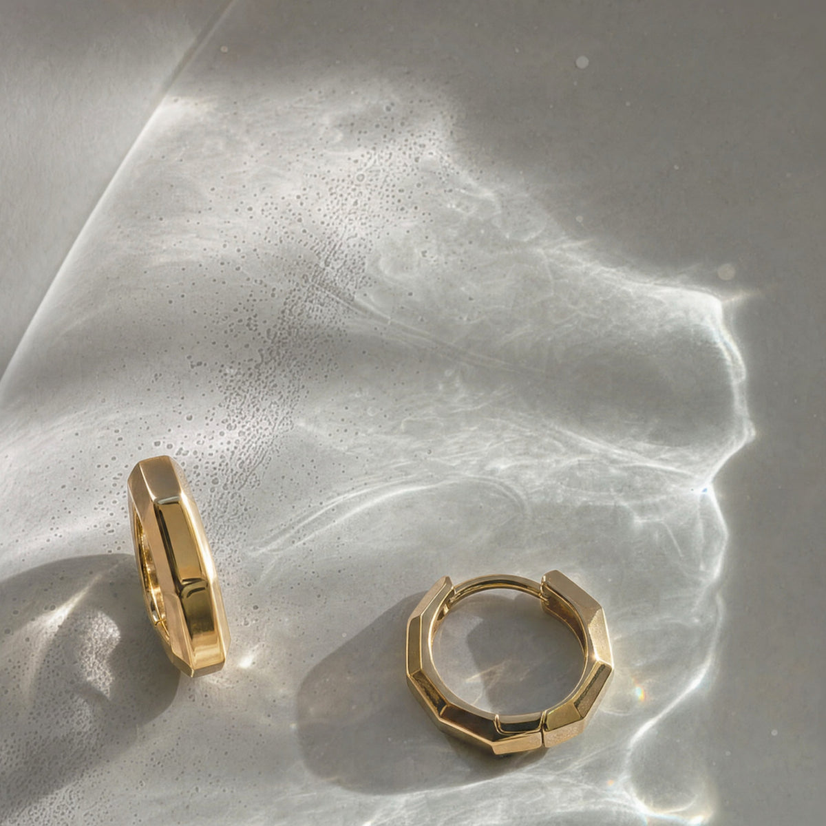 Wishing Coin sterling silver hoop earrings.