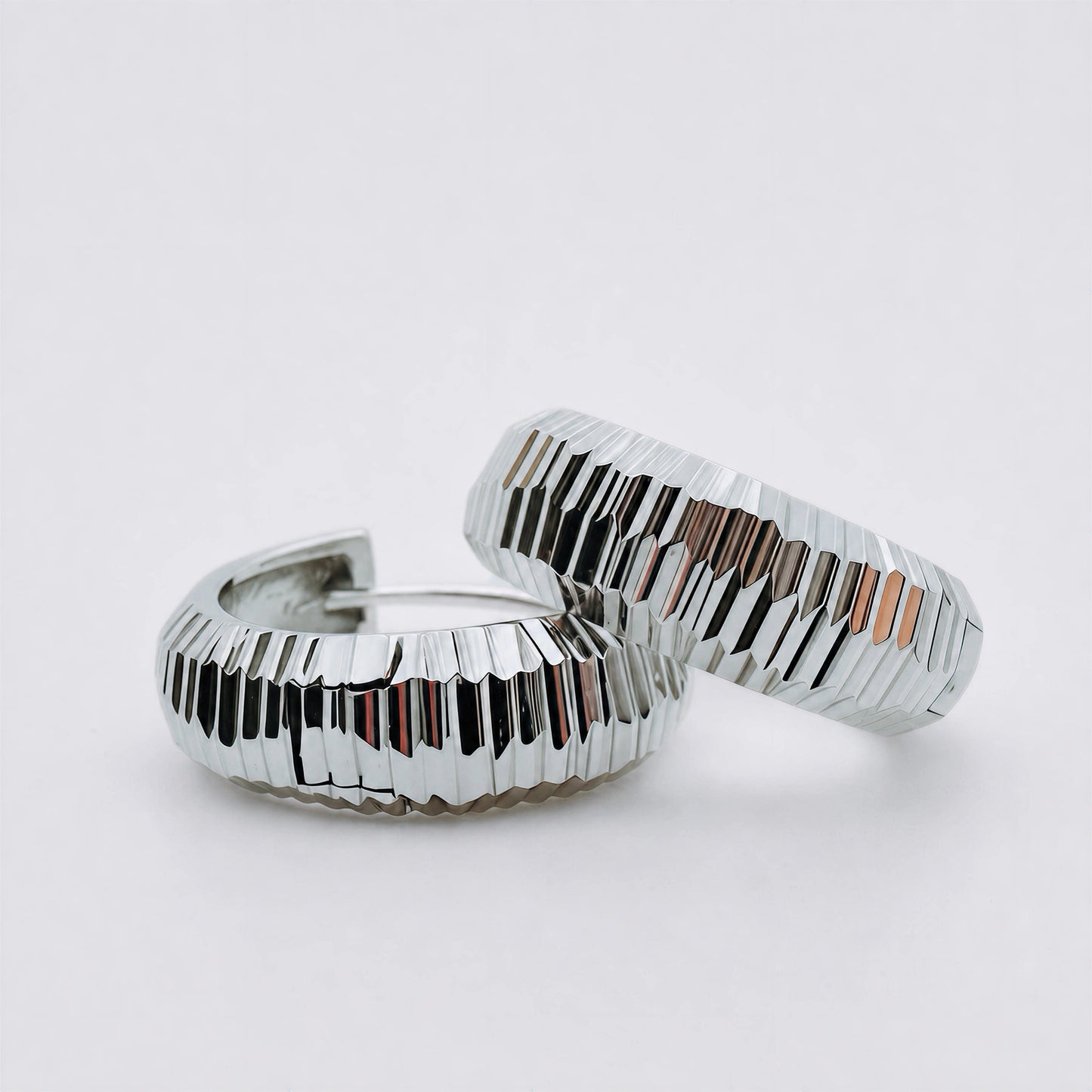 Peak Light sterling silver stud earrings by Orin