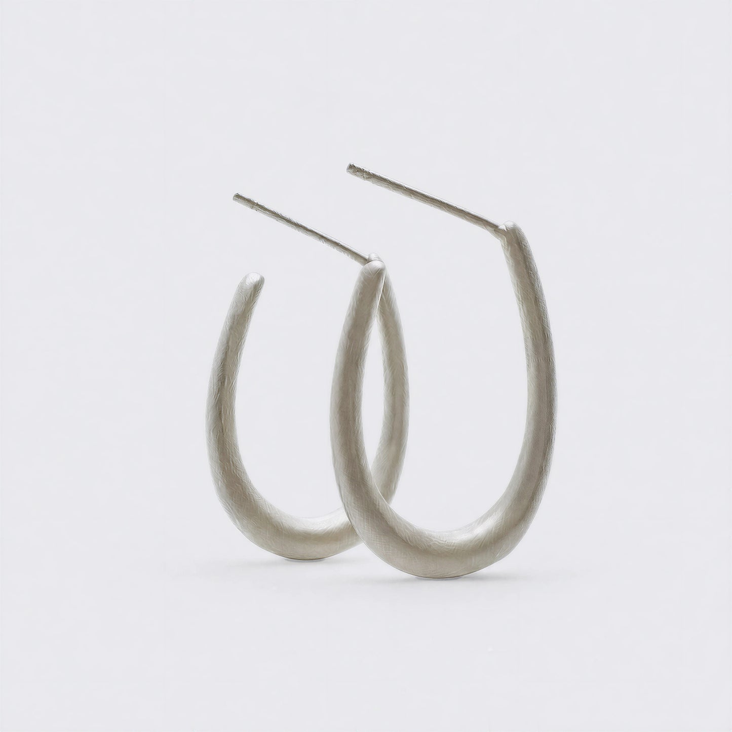 Quiet Loop 925 sterling silver hook earrings by Orin