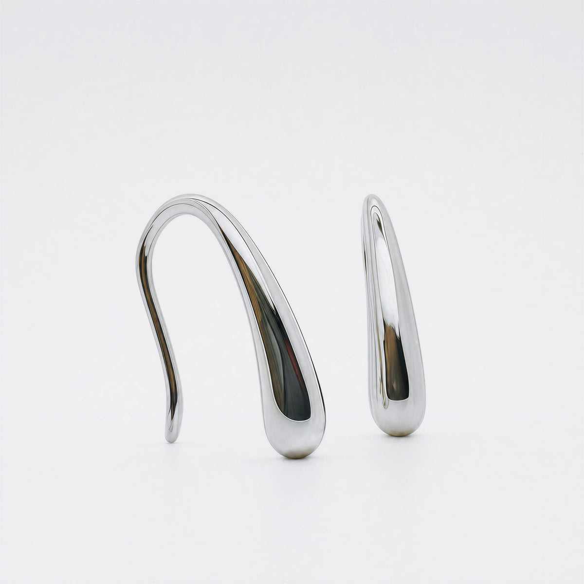 Silent Palm sterling silver hook earrings.