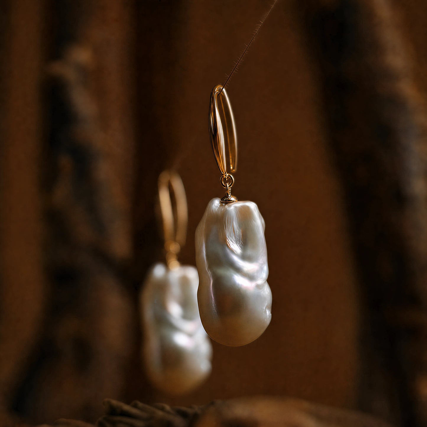 Tide Stone freshwater pearl earrings in natural light.