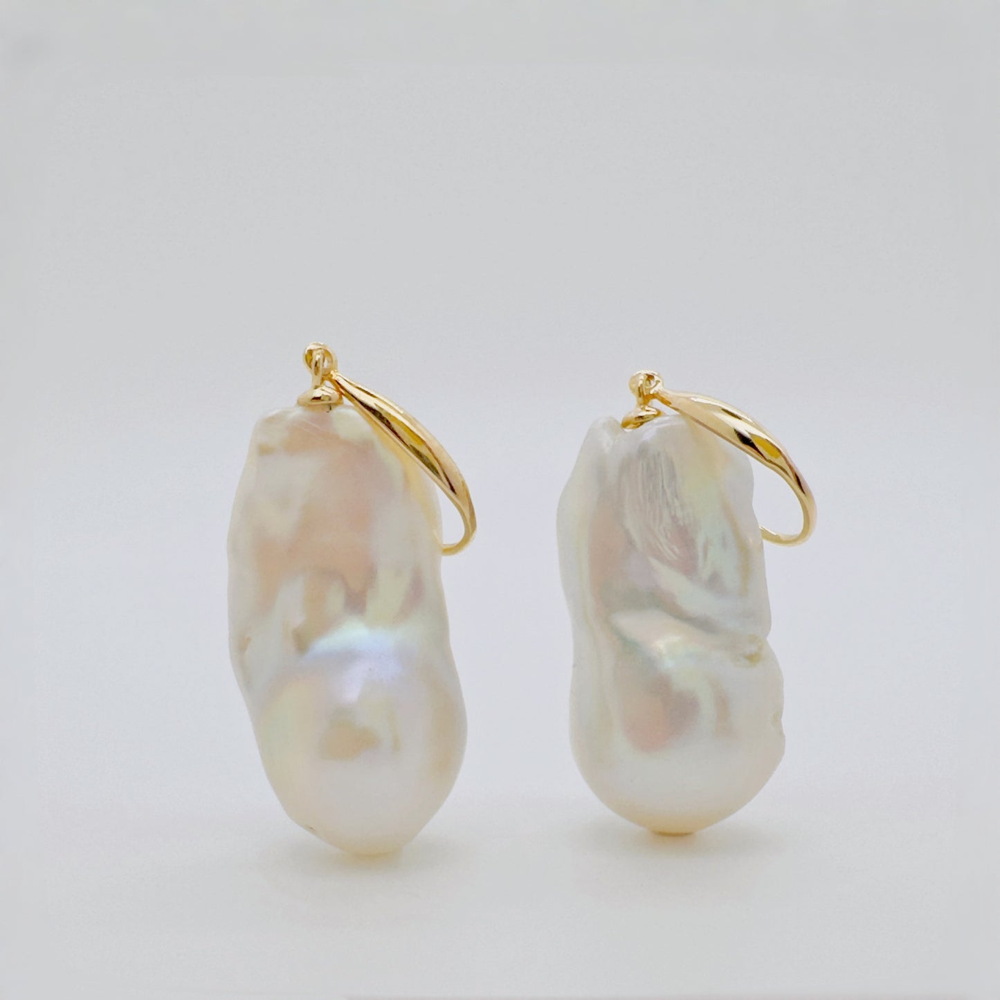 Tide Stone freshwater pearl earrings in natural light.
