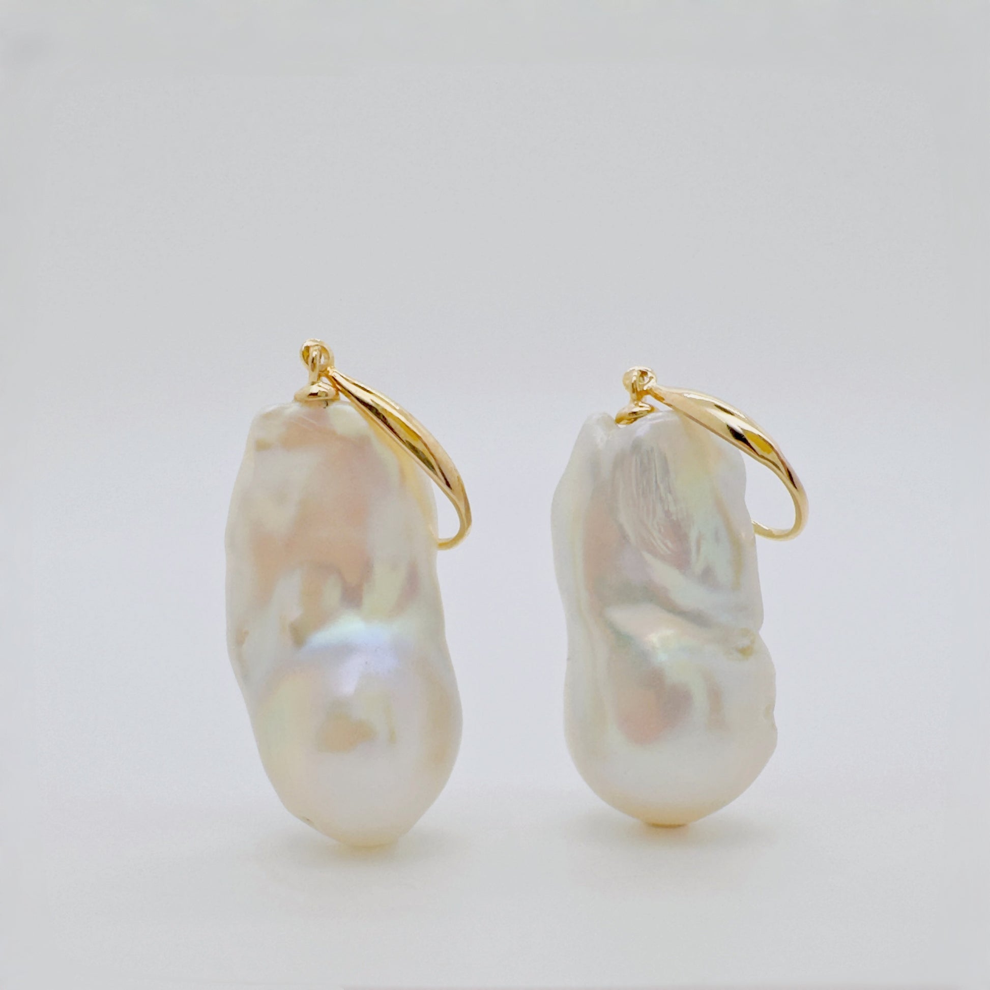 Tide Stone freshwater pearl earrings in natural light.