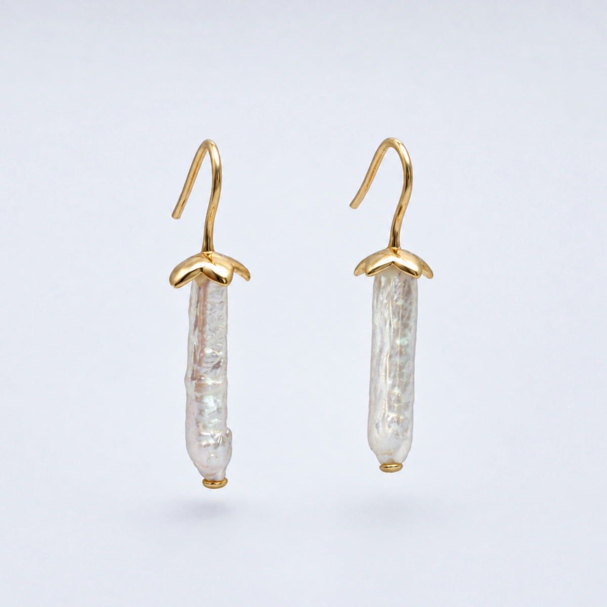 Vesper Light long baroque freshwater pearl earrings in gold-plated sterling 