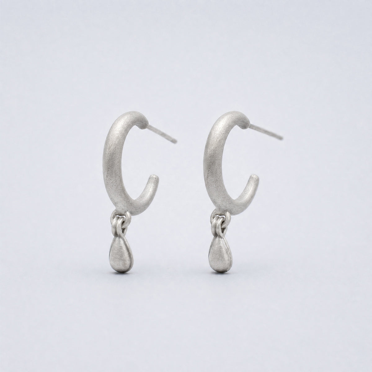Silent Drop solid S925 sterling silver drop earrings with curved sculptural form