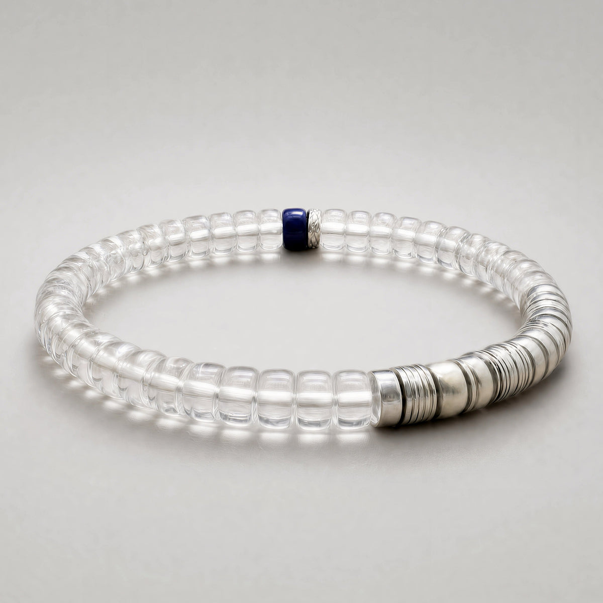 Tide 01 clear quartz and lapis lazuli bracelet with sterling silver details